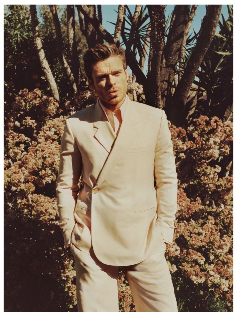 Richard Madden sports a double-breasted Dior Men suit with a David Hart shirt.