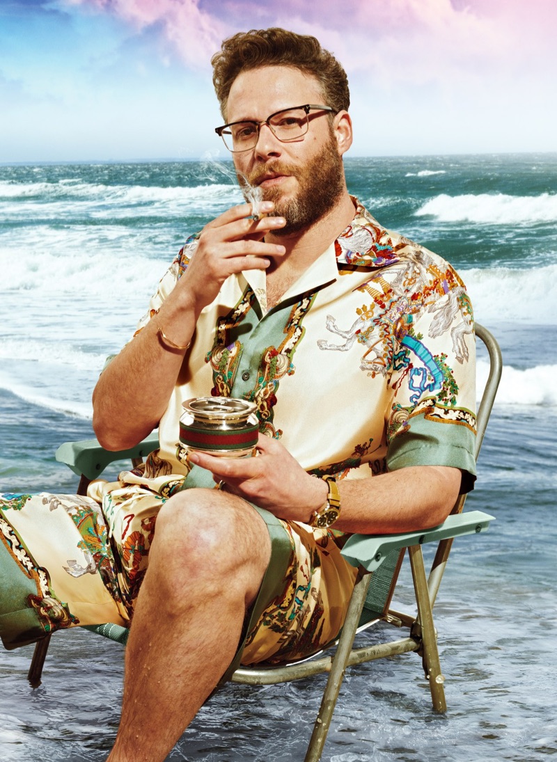 Sporting coordinated pieces, Seth Rogen dons a silk shirt and shorts by Gucci with a Tudor watch.