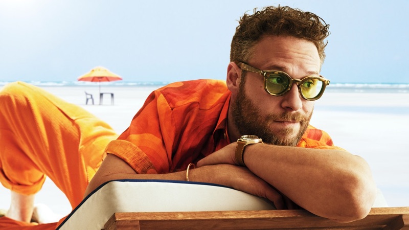 Actor Seth Rogen wears a Dries Van Noten shirt, The Elder Statesman pants, White Mountaineering x Jacques Marie Mage sunglasses, and Tudor watch.