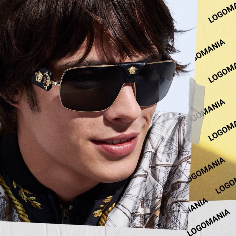 Making a logo statement, Louis Baines rocks Versace sunglasses $285.