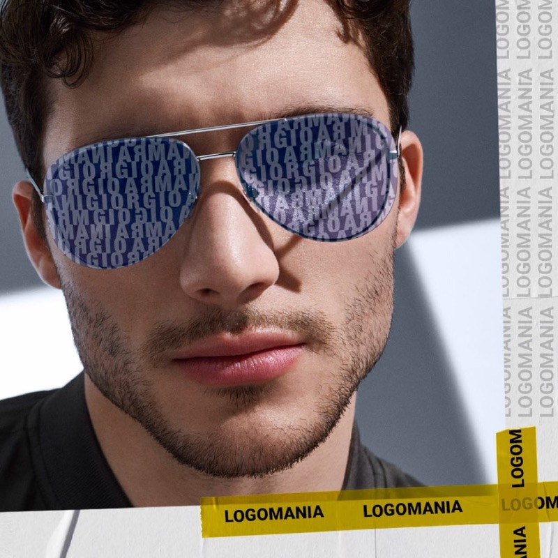 Connecting with Sunglass Hut, Fredrik Massa models Giorgio Armani logo sunglasses $300.