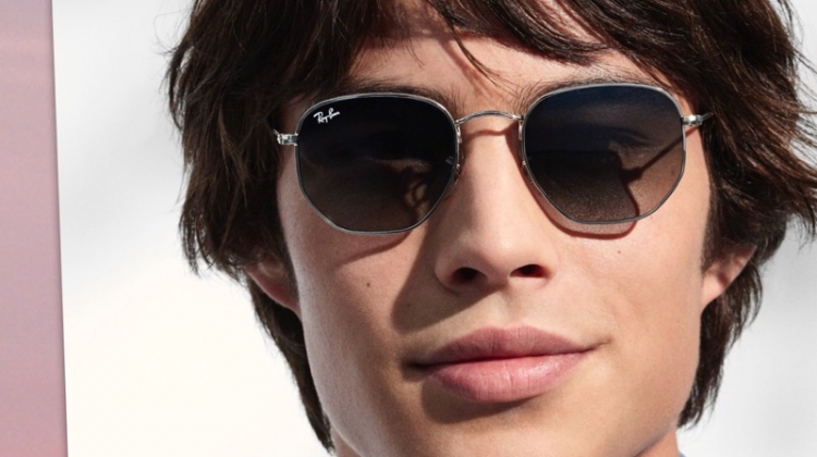 Louis Baines sports polarized Ray-Ban sunglasses $203.