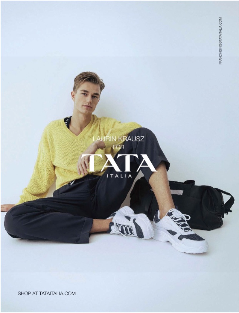 Sporting a yellow sweater, Laurin Krausz fronts TATA Italia's spring-summer 2019 campaign.