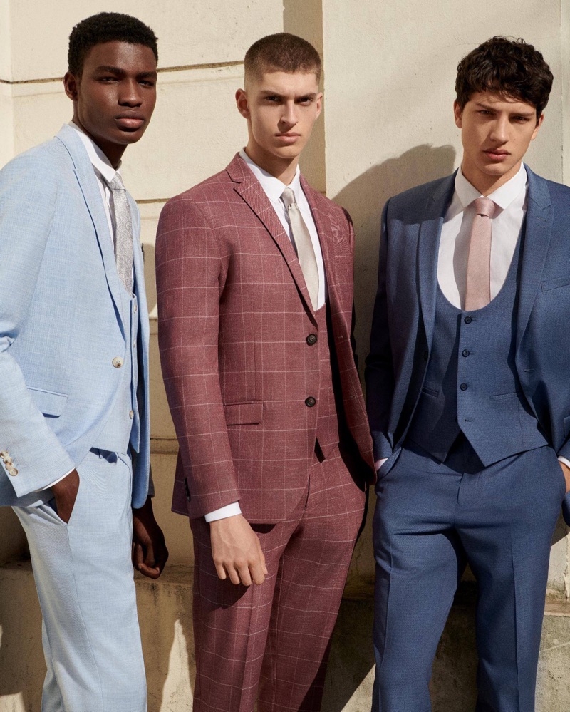 Models Michael Chima, Azim Osmani, and Romain Hamdous star in Topman's suit campaign.