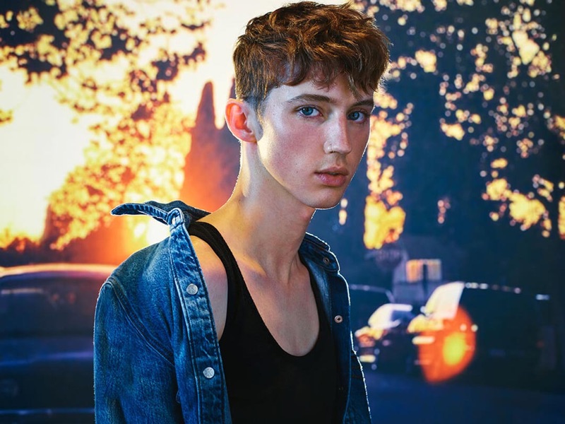 Sporting denim and a tank, Troye Sivan fronts Calvin Klein's spring-summer 2019 #MYCALVINS campaign.