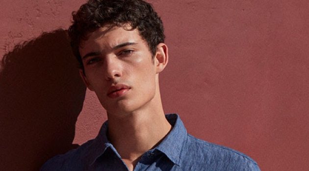 Step Into Summer Linen by UNIQLO Piero Méndez models a UNIQLO premium linen long-sleeve shirt $29.90.