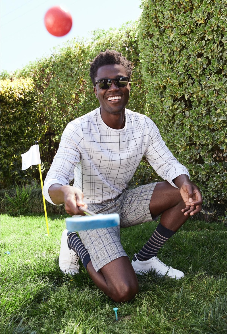 Mixing checks Remi Alade-Chester rocks Warby Parker's Fletcher sunglasses.