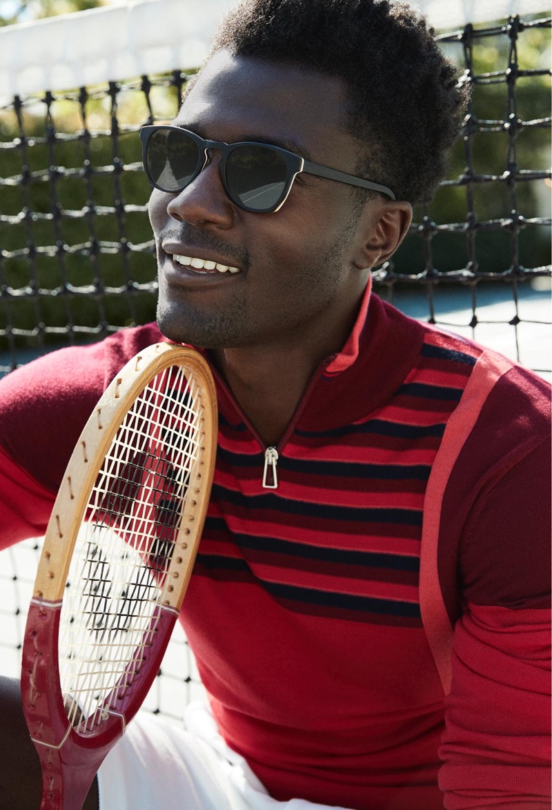 Ready for a game of badminton, Remi Alade-Chester sports Warby Parker's Topper sunglasses.