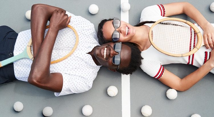 All smiles, Remi Alade-Chester wears Warby Parker's Fletcher sunglasses.