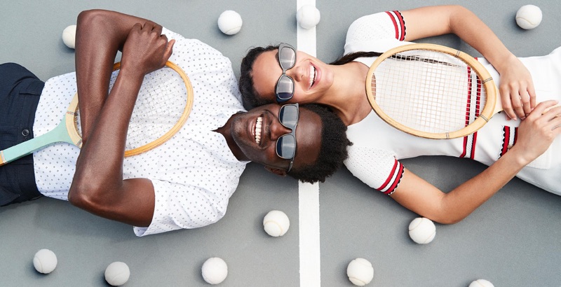 All smiles, Remi Alade-Chester wears Warby Parker's Fletcher sunglasses.