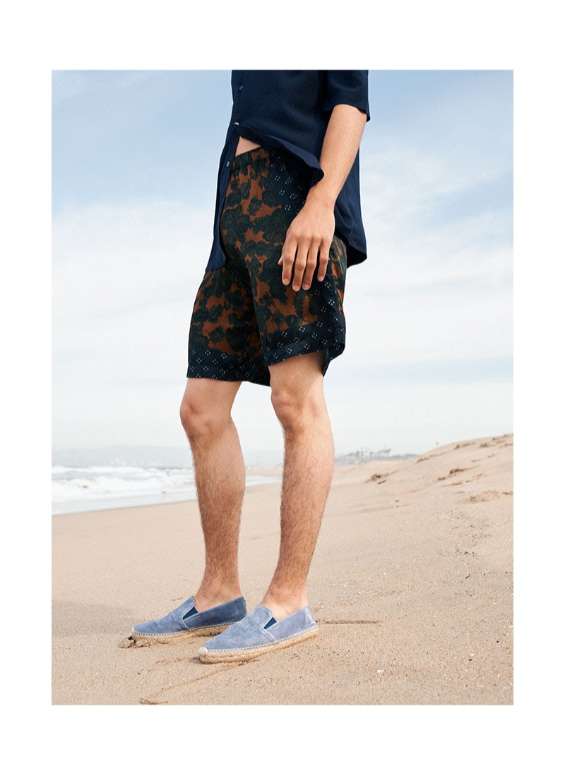 Embracing summer style, Lucas Bin sports light blue espadrilles from YOOX.