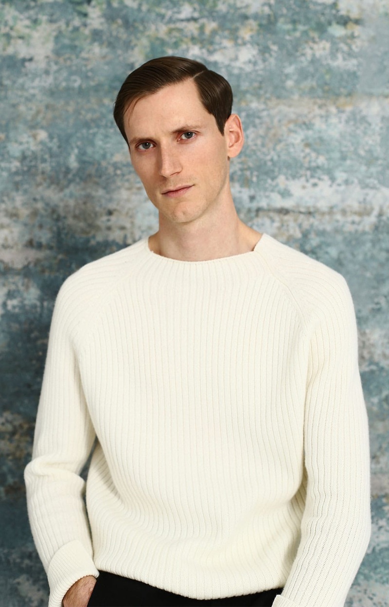 Taking aim at a serene look, Bastiaan Ninaber wears a Joseph sweater with Fendi trousers.
