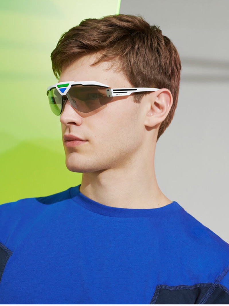 A futuristic vision, Bo Develius rocks Prada runway sunglasses.