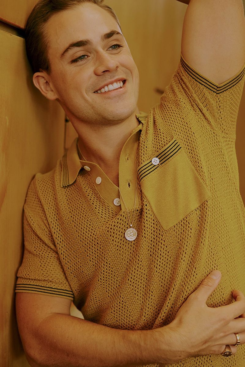 All smiles, Dacre Montgomery wears a Todd Snyder polo.