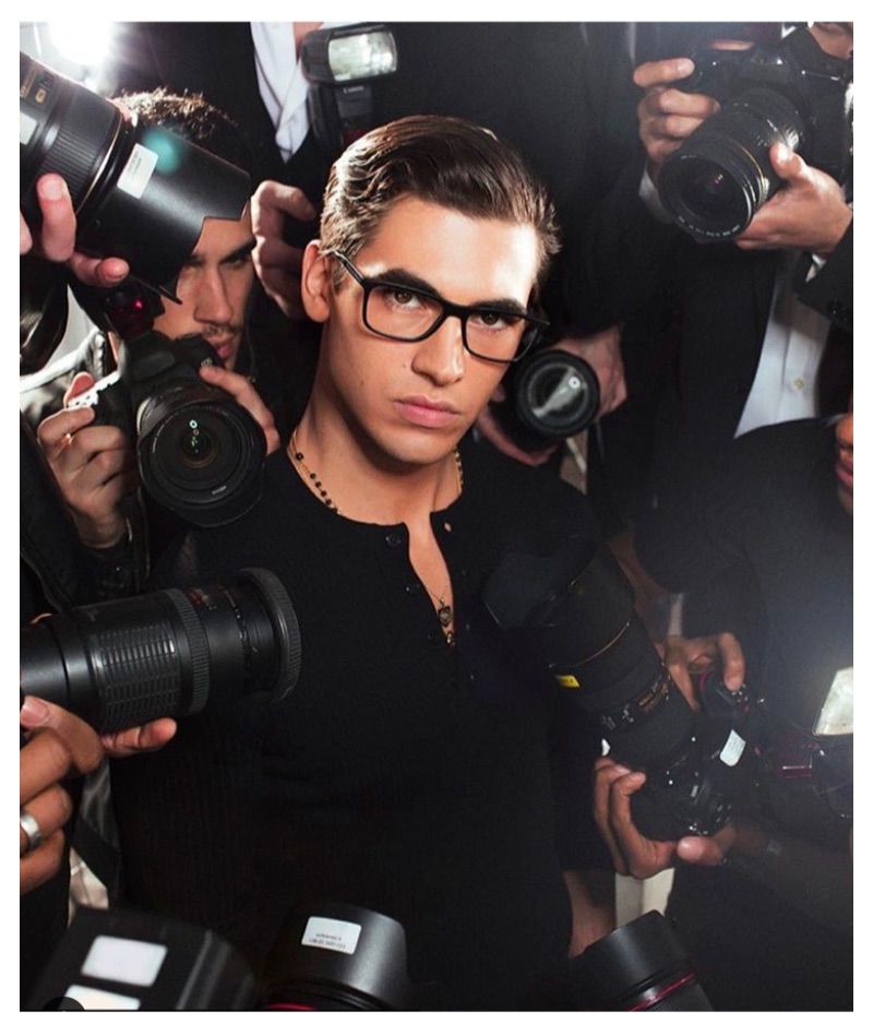 Donning black framed glasses, model Marco Bellotti stars in Dolce & Gabbana's latest eyewear campaign.