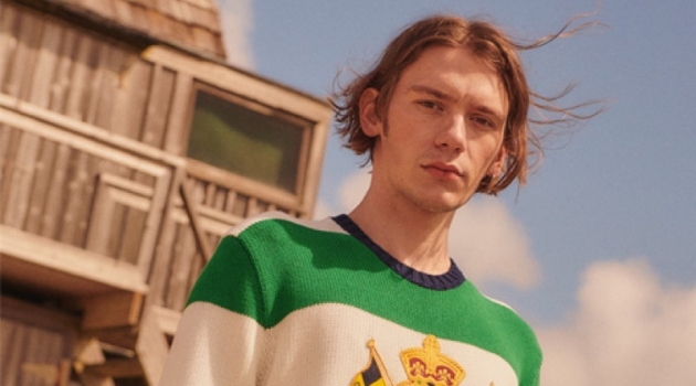East Dane Proposes Casual Summer Styles to Pack for a Weekend Getaway Luca Bertea sports a POLO Ralph Lauren crest stripe sweater and Montauk chino shorts.