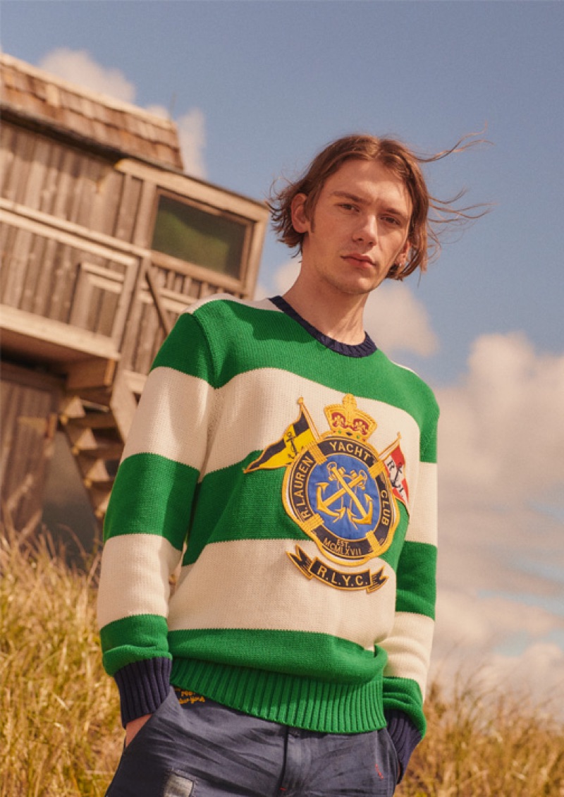 Luca Bertea sports a POLO Ralph Lauren crest stripe sweater and Montauk chino shorts.