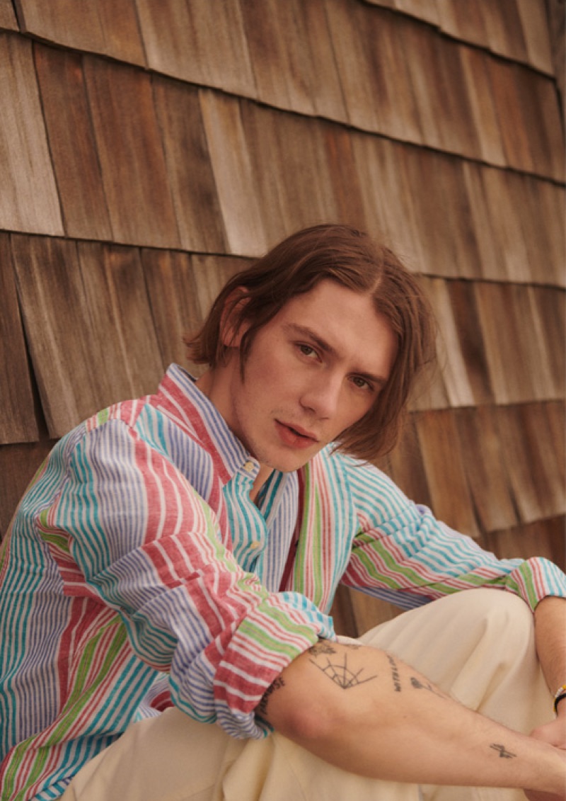 Reuniting with East Dane, Luca Bertea sports a POLO Ralph Lauren striped linen shirt and Albam drawstring trousers. 