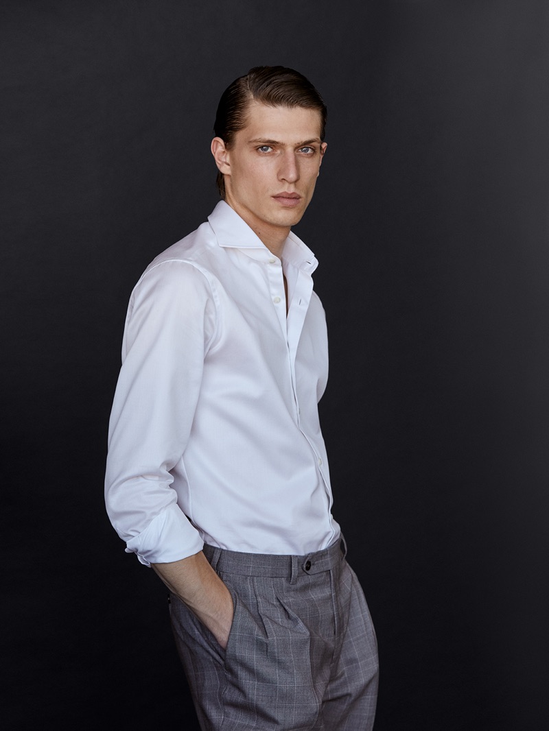 Sporting a clean shirt and trousers look, Edoardo Sebastianelli wears Massimo Dutti.