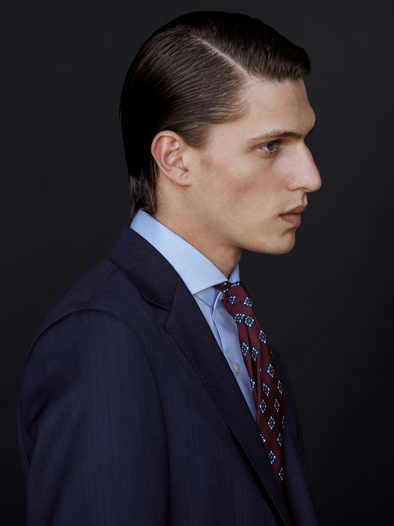 Delivering a side profile, Edoardo Sebastianelli models a look by Massimo Dutti.