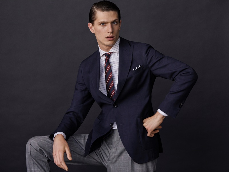 Edoardo Sebastianelli dons a sharp suit look from Massimo Dutti.