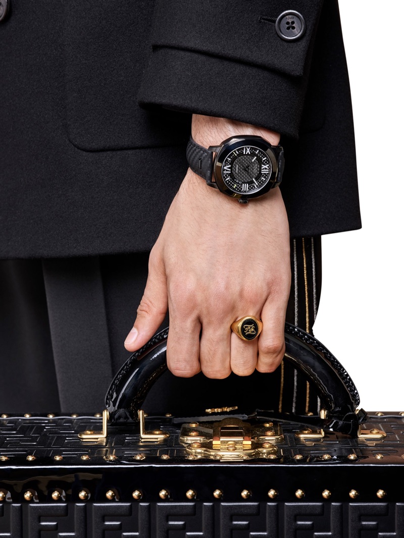 Model Aramish Mangi dons Fendi's Selleria automatic watch with interchangeable straps $2,800.