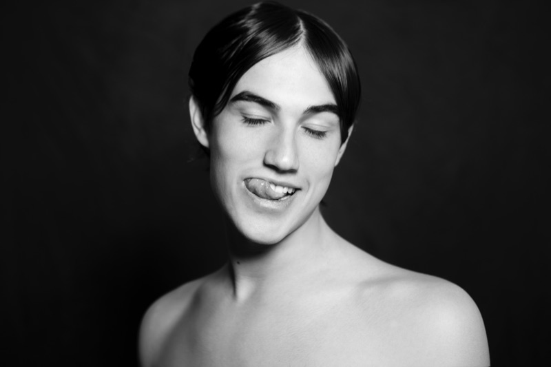 Nologo Mgmt model Gianmarco Lusiani sits for a cheeky photo.