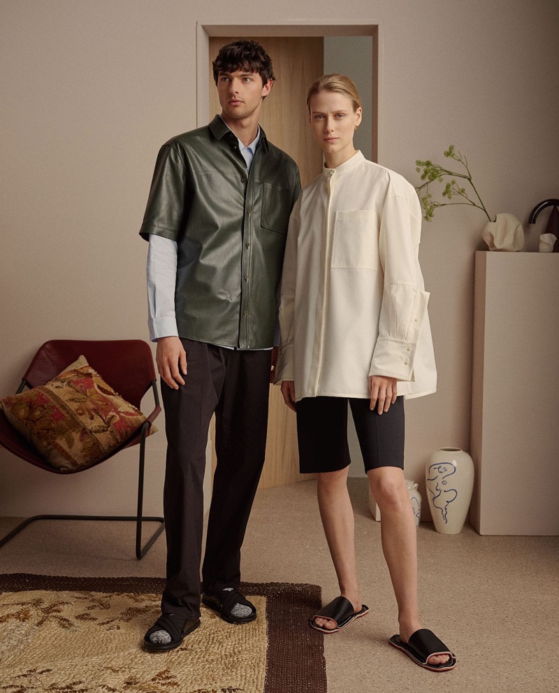 Pictured left, Hannes Gobeyn models a leather shirt and trousers by Bottega Veneta. A Berena Venezia long-sleeve shirt and Prada slides complete his look.