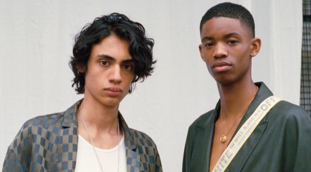 Rave New World: Montell Martin & Benjamin Lessore for Harrods Magazine From left, Benjamin wears HAIDER ACKERMANN shirt £1,215; HARRODS OF LONDON vest £34.95; ETUDES trousers £310; DSQUARED2 belt £220; VIVIENNE WESTWOOD necklace £175; Montell wears HAIDER ACKERMANN coat £1,830; VERSACE necklace £550; OFF-WHITE belt (worn across body) £150