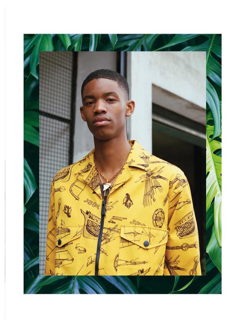 Montell wears ERMENEGILDO ZEGNA shirt and vest, both from a selection; VERSACE shark-tooth necklace £370; HERON PRESTON padlock necklace £245