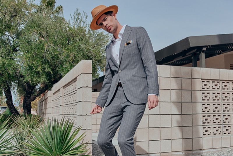 Step up your style game with a grey pinstripe suit by INDOCHINO.