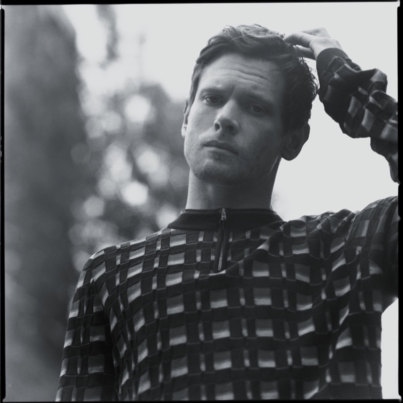 Connecting with The Last Magazine, Jack O'Connell sports a graphic sweater by Pringle of Scotland.