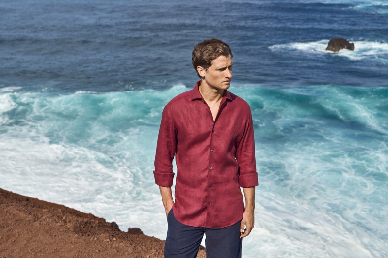 British model Tom Warren wears a red linen shirt for Luca Faloni's summer 2019 campaign.