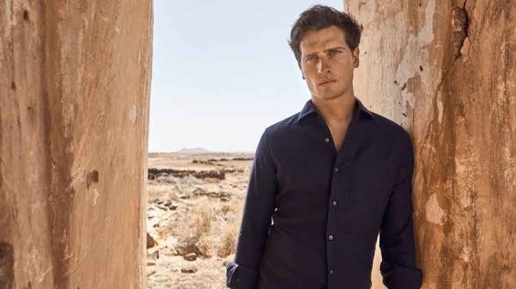 Appearing in Luca Faloni's new campaign, Tom Warren models a midnight blue linen shirt.