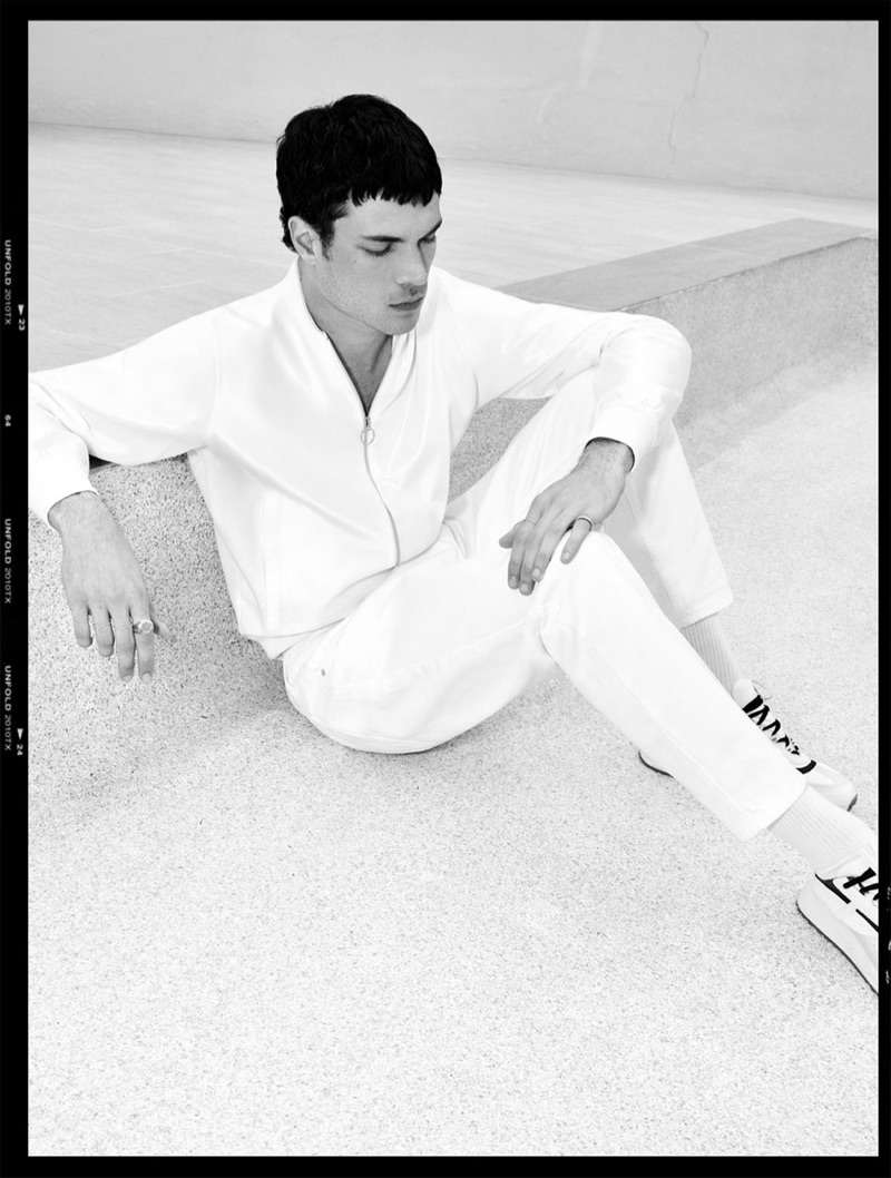 Sporty in white, Luka Isaac rocks Zara.