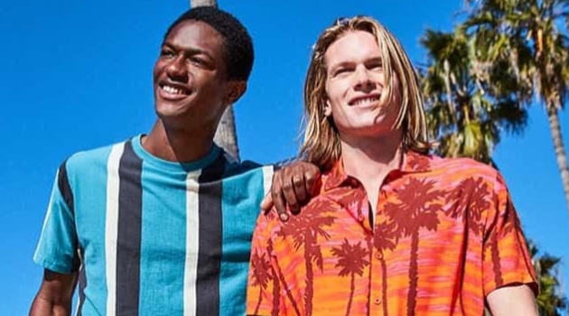 Color Pop: Macy's Sets the Framework for a Colorful Summer All smiles, Hunter Bach and Hamid Onifade sport colorful summer fashions from Macy's.