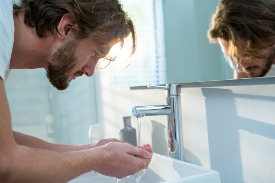 Man Washing Face