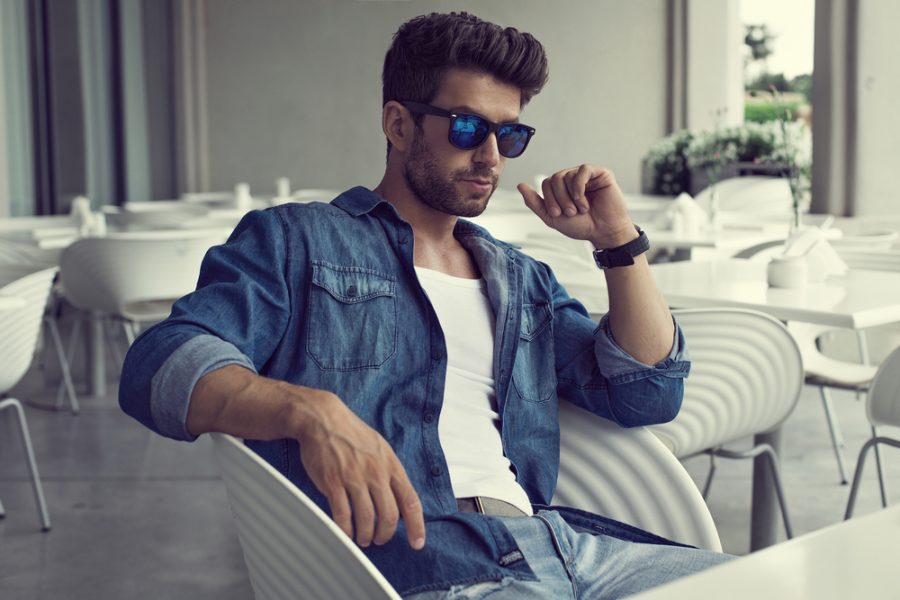 Man Wearing Denim Shirt Jeans and Blue Sunglasses Man Wearing Denim Shirt Jeans and Blue Sunglasses