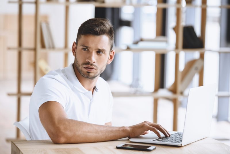 Man on Laptop Working