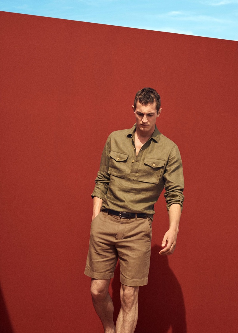 Donning a safari-themed color palette, Rutger Schoone wears a linen shirt and shorts from Mango Man.