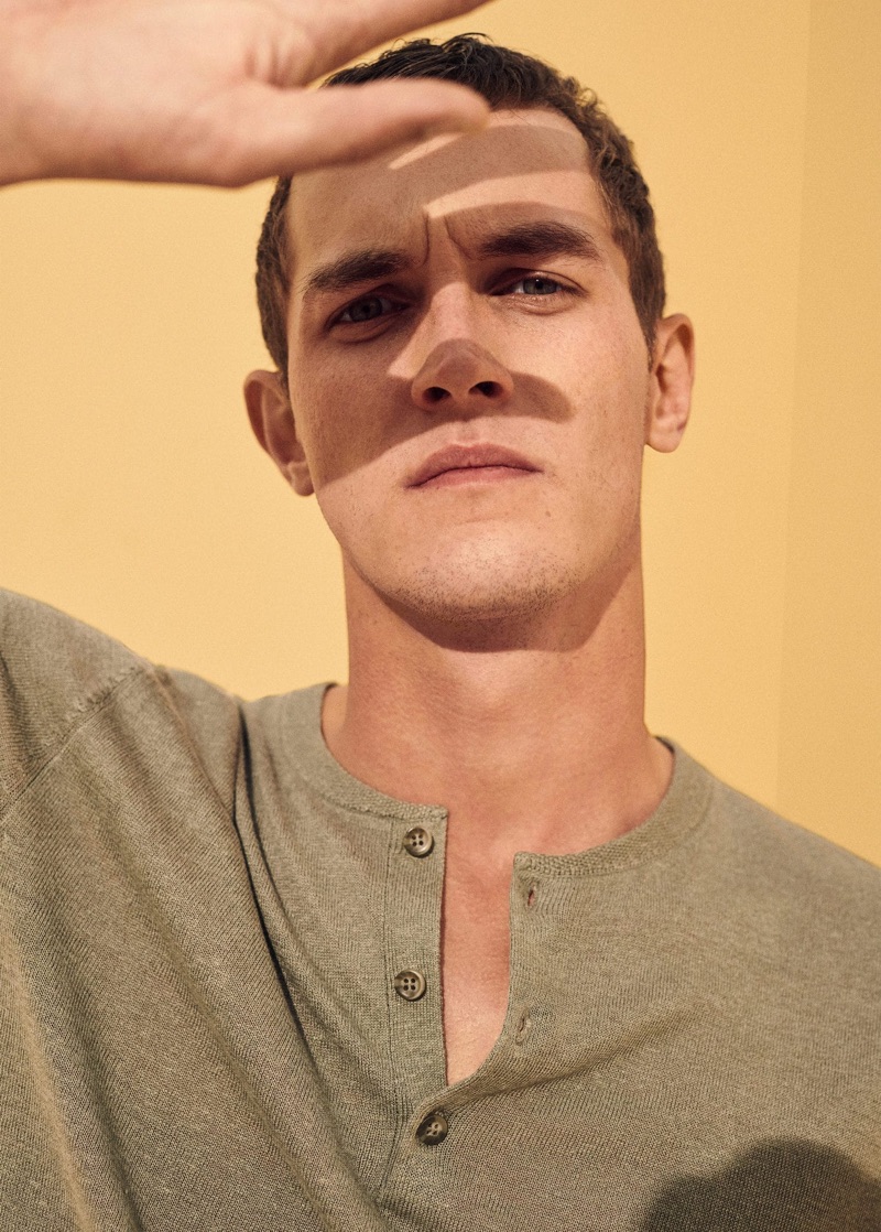 Model Rutger Schoone wears a summer henley from Mango.