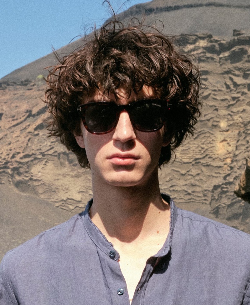 Easily cool, Gena Malinin rocks Jacques Marie Mage sunglasses with a Once Milano band-collar shirt.