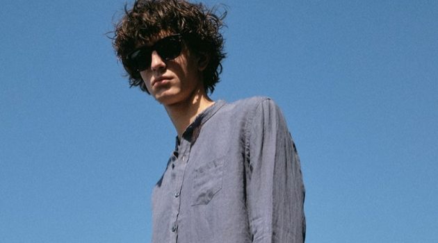Matches Fashion Proposes Chic Summer Shirts Venturing outdoors, Gena Malinin dons Jacques Marie Mage sunglasses with a Once Milano band-collar shirt and Officine Generale trousers.