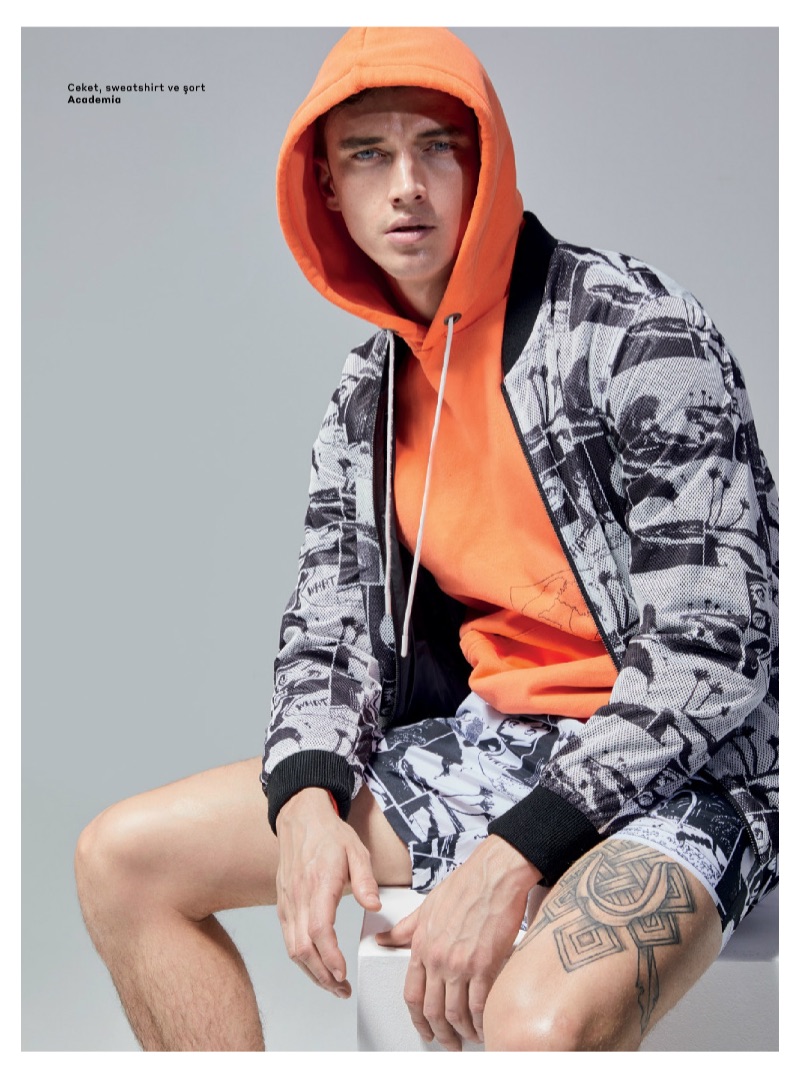 Going sporty, Matthew Holt wears an all-over print from Academia.