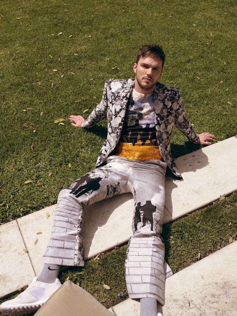 Actor Nicholas Hoult wears a look by Louis Vuitton.