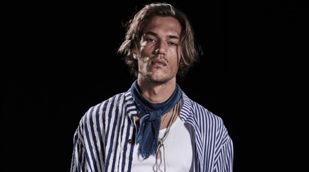 The Nomad Goes Nautical for Paul & Shark by Greg Lauren Spring '20 Collection Robin Decaux dons a striped shirt and cable-knit pants from Paul & Shark by Greg Lauren.