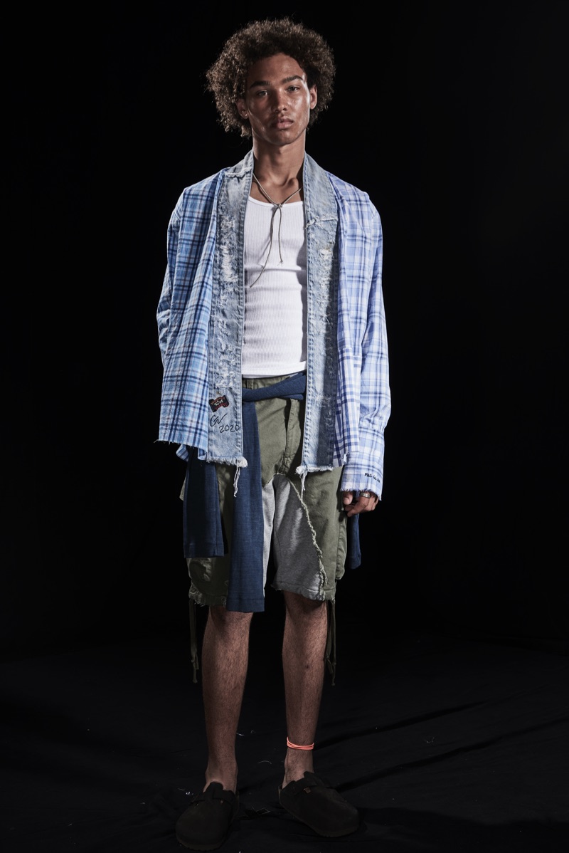 Front and center, Miles Anderson dons deconstructed fashions from Paul & Shark by Greg Lauren.