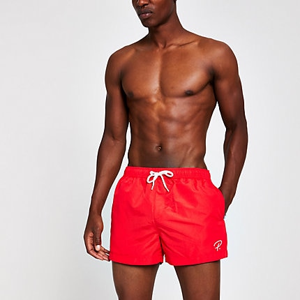 River Island Mens Red ‘Prolific’ tape swim trunks | The Fashionisto