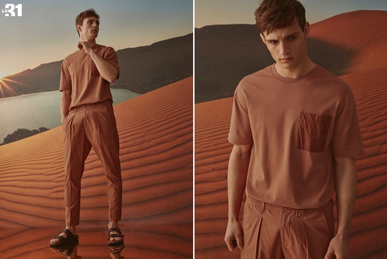 Top model Julian Schneyder wears a LE 31 nylon pocket t-shirt and pull-on pants with Birkenstock Arizona sandals.