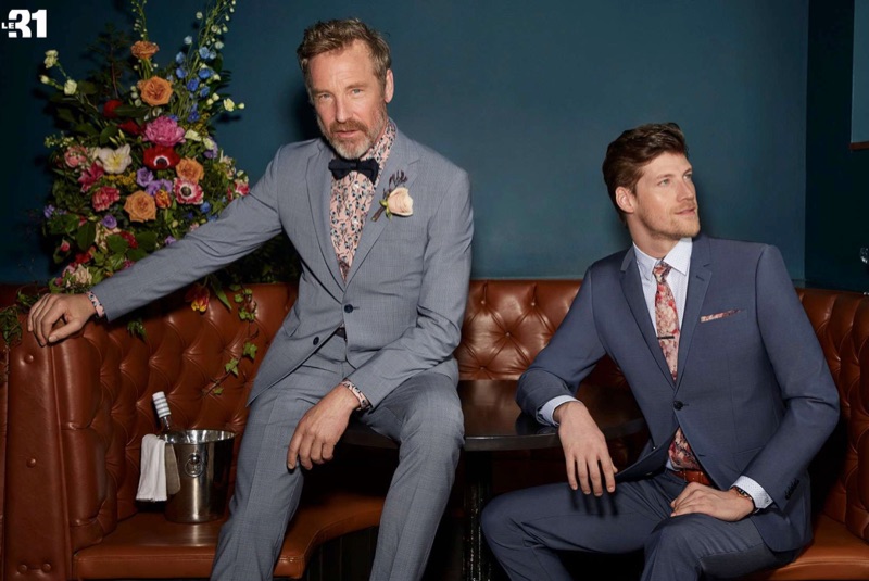 Left: Rainer Andreesen models a LE 31 houndstooth suit with a printed shirt. Right: Alex Loomans dons a LE 31 chambray blue traveler suit with a Blick English garden tie and pocket square.